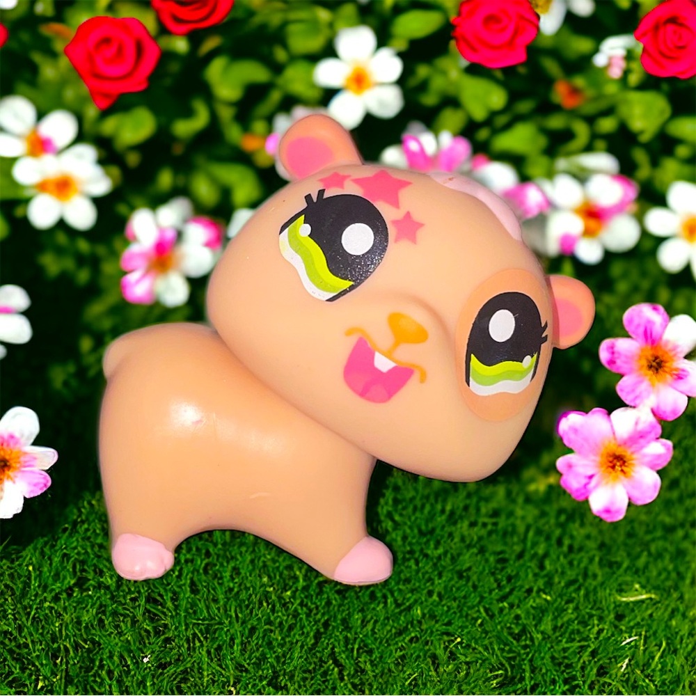 littlest pet shop # 1341 tan orange hamster with pink stars and green eyes
